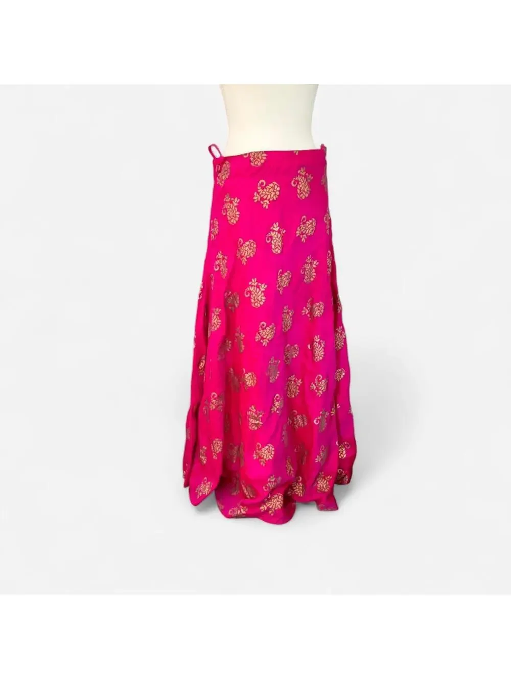 Pink and gold floral maxi skirt with a flowy design